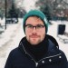 Man modeling Atticus in black