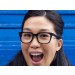 Woman modeling black wayfarer eyeglasses