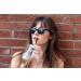 Woman model wearing sunglasses diagonal view