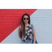 Woman modeling aviator sunglasses front view