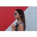 Woman modeling aviator sunglasses profile view