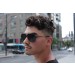 Man wearing sunglasses profile view