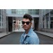 Male model wearing sunglasses frontal view