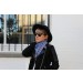 Female model wearing sunglasses frontal view
