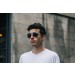 Man modeling aviator sunglasses angled view