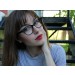 Woman modeling black cateye eyeglasses