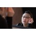 Woman trying on Wharton two-tone eyeglasses